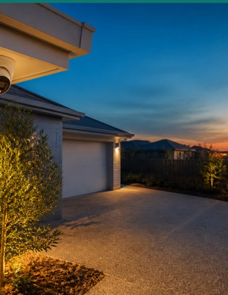 Dual-light turret watching a driveway at dusk. Product shot may differ from the actual product. Dual-light turret watching a driveway at dusk. Product shot may differ from the actual product.