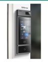 Akuvox S535 with LTE module mounted beside a glass entrance