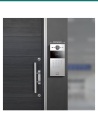 Akuvox R20K-L silver door phone mounted beside a narrow entry door