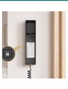 Akuvox S560 base unlock button beside the handset cradle