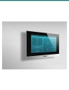 Akuvox C313S silver indoor monitor mounted on a wall