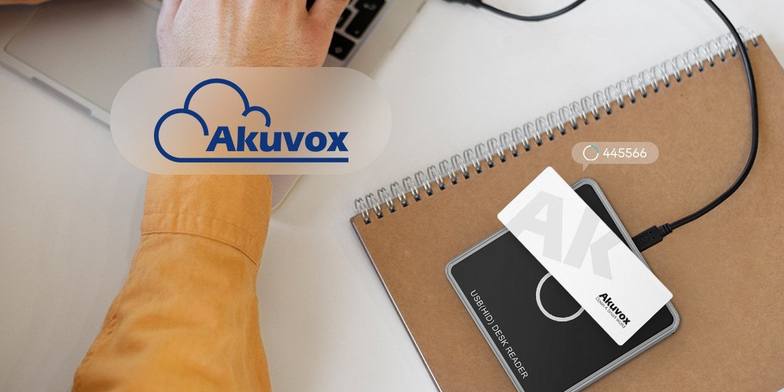 Akuvox ACR-CID12 UHF desktop reader beside a laptop