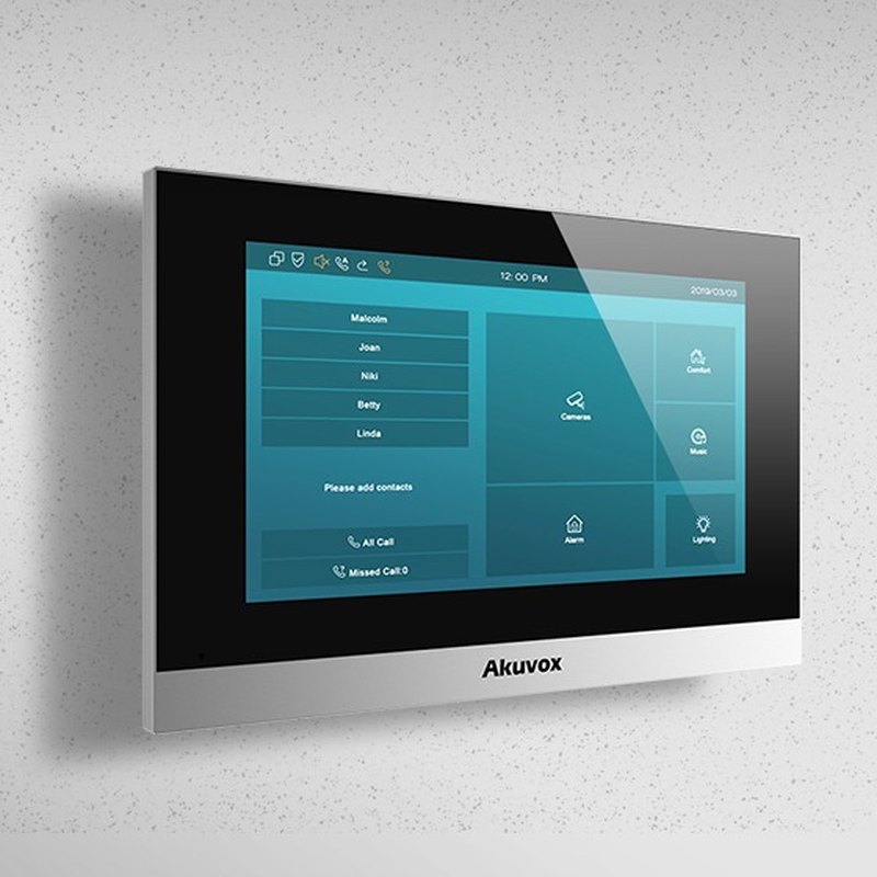 Akuvox C313 silver indoor monitor mounted on a wall