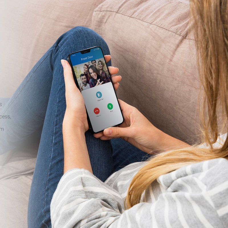Resident answering an Akuvox E12S door call on a smartphone