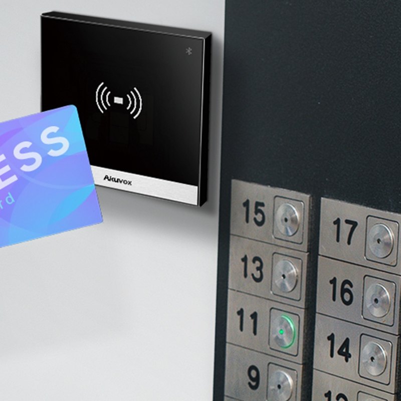 Card presented to a reader beside lift buttons