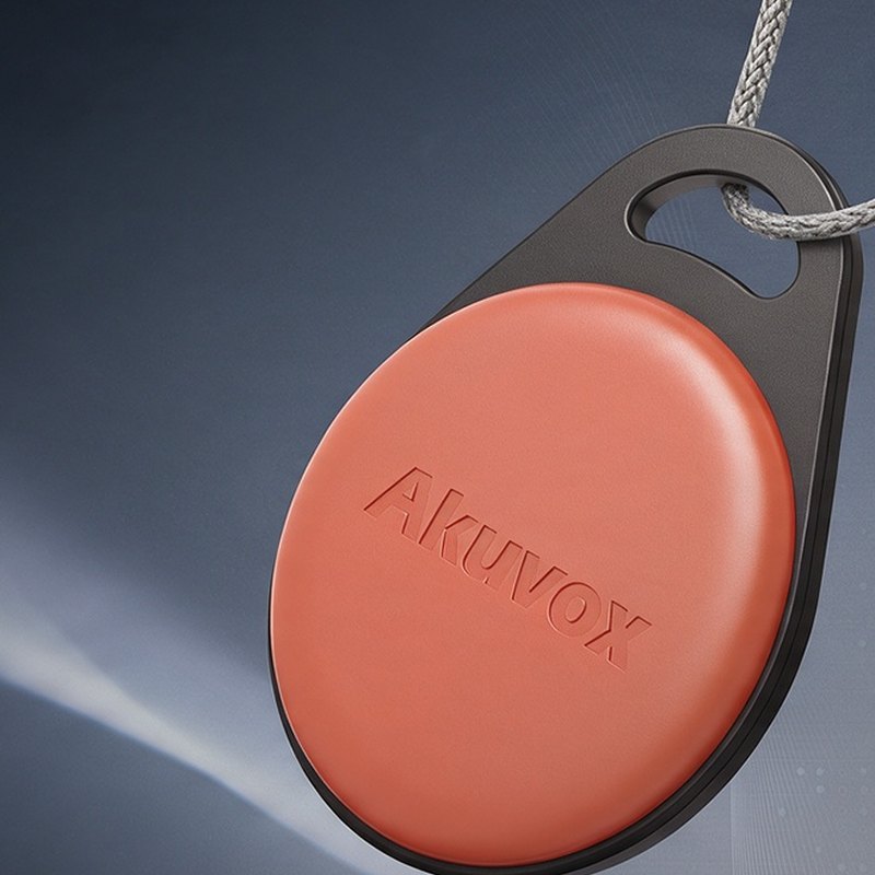 Akuvox KF02 orange key fob on a cord