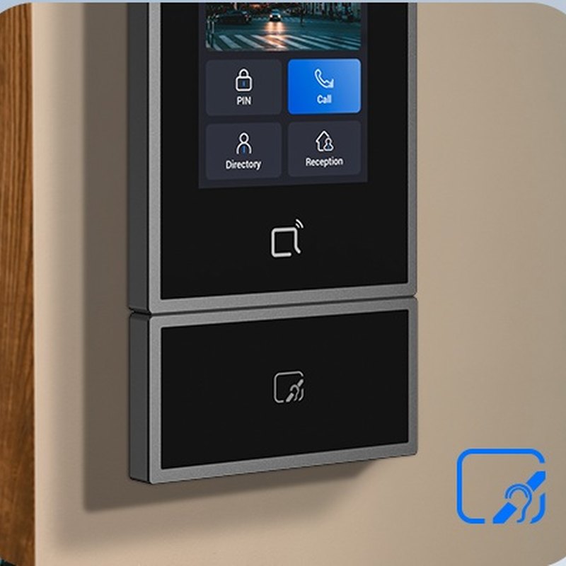 Akuvox S535 induction loop module fitted under the door phone on a timber wall