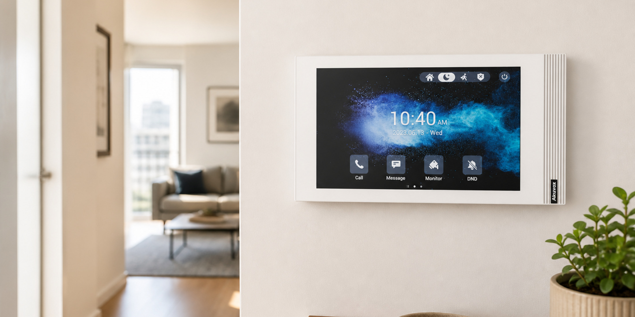 Akuvox S562 white indoor monitor flush-mounted in a bright Australian apartment hallway