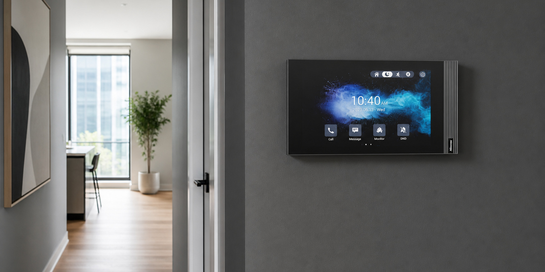 Akuvox S562 indoor monitor on a modern apartment corridor wall