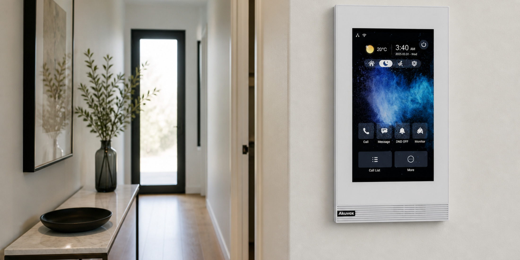 Vertical Akuvox S562-V white indoor monitor on a narrow apartment hallway wall
