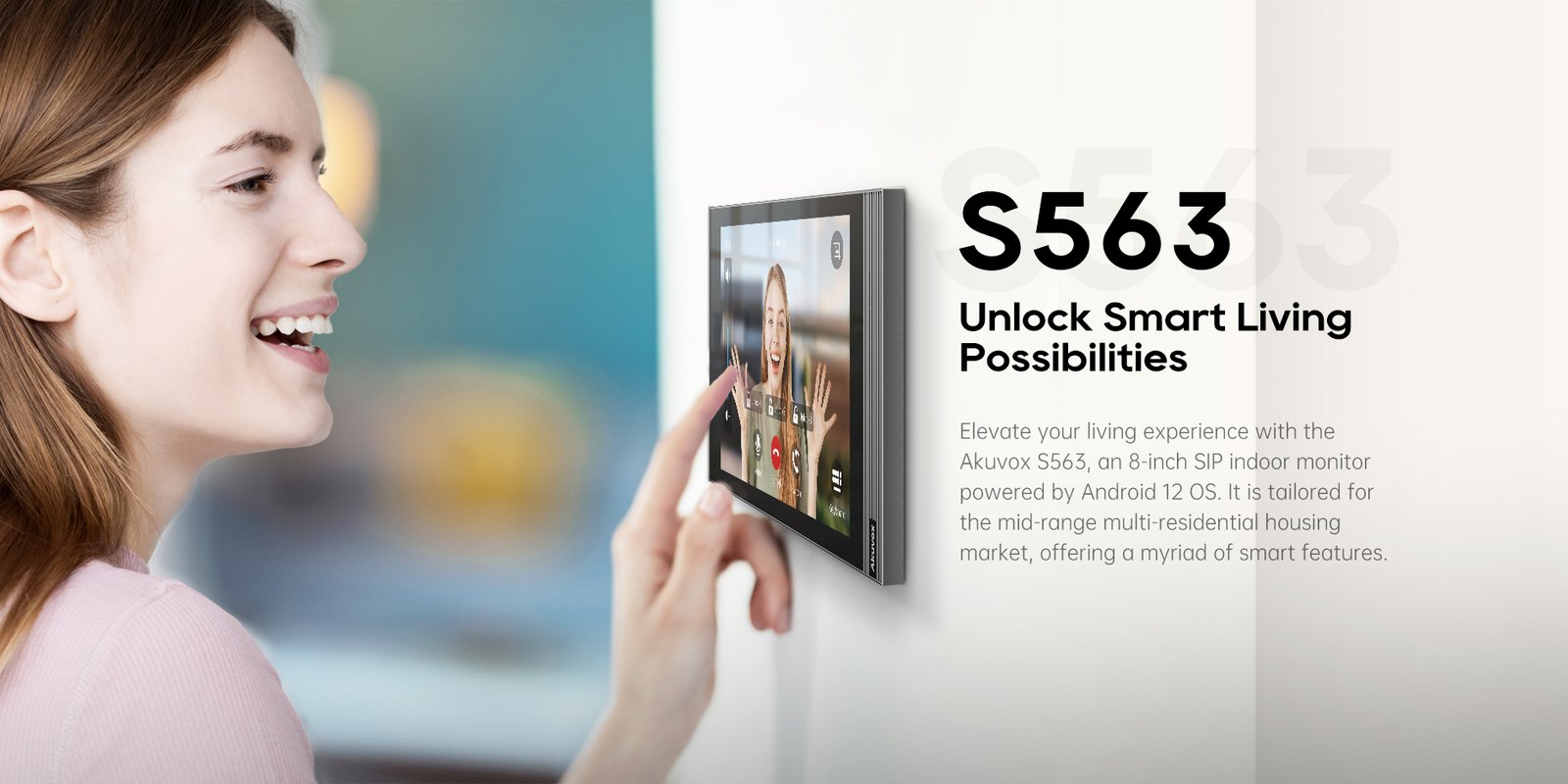 Resident answering the door on an Akuvox S563 8-inch indoor monitor