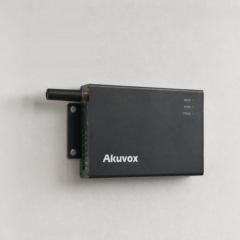 Akuvox WR01 web relay mounted on a wall beside a glass office door