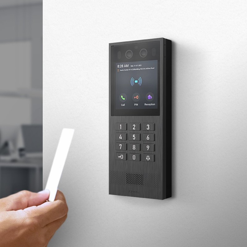 Card being presented to an Akuvox X912K on a wall