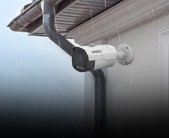 IVSEC bullet camera installed under an eave in heavy rain, IP67 weatherproof