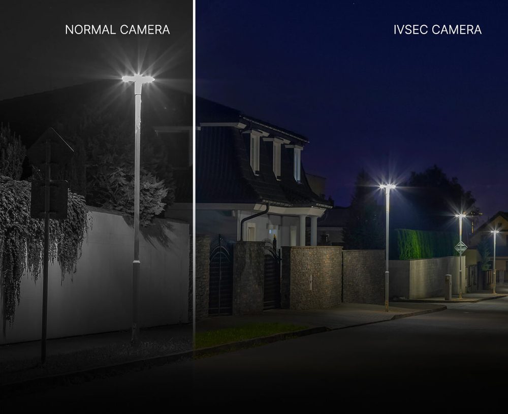 A street at night recorded by a normal camera beside the same street in colour from an IVSEC camera