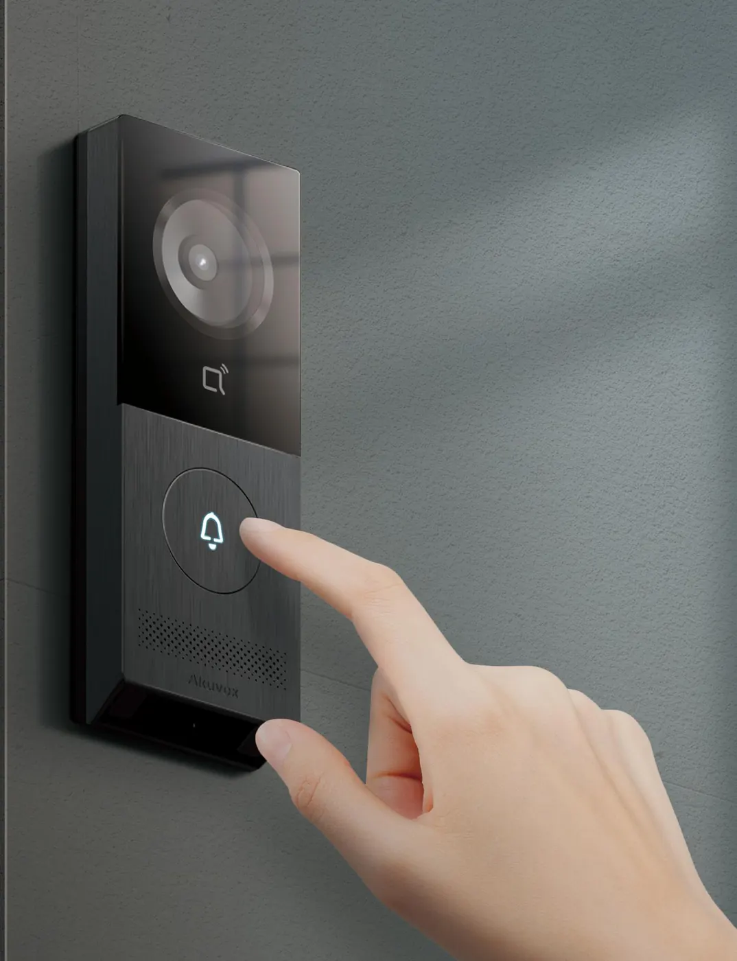 Finger pressing the call button on an Akuvox door phone