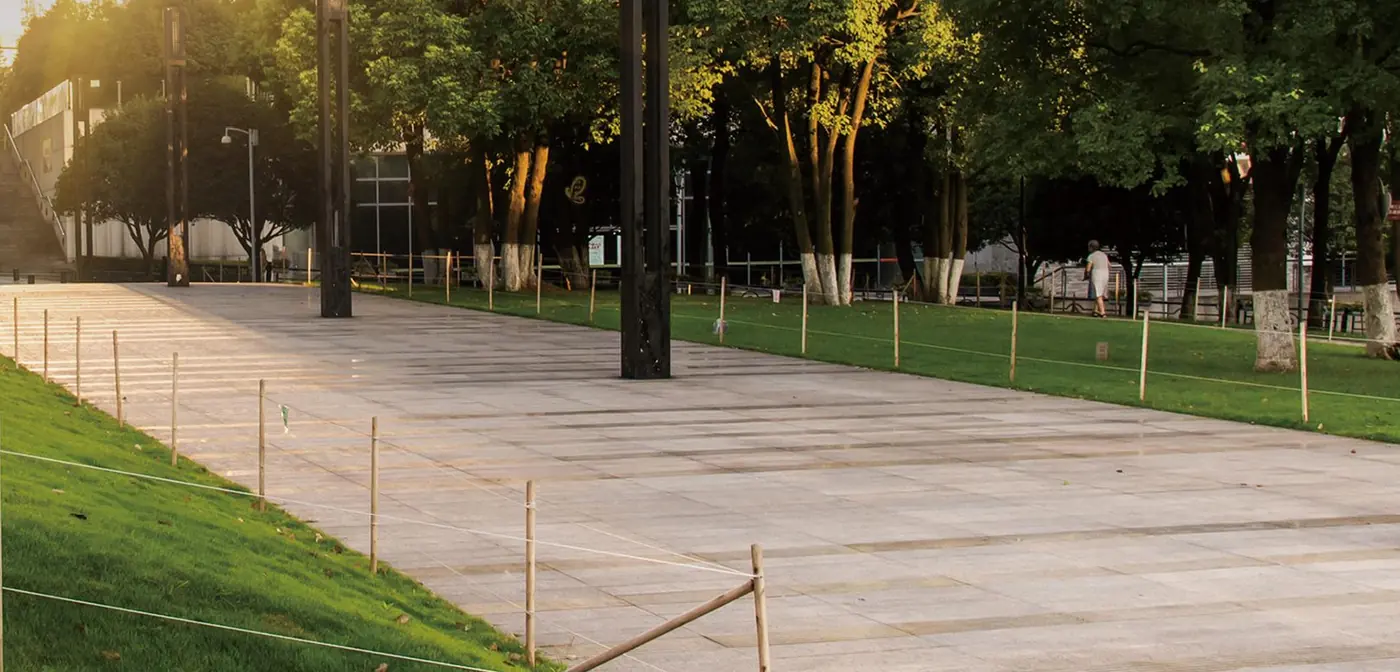 Public park path at sunset