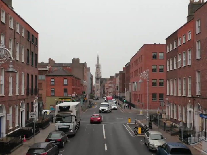 A Uniview camera covering a street and shopfronts