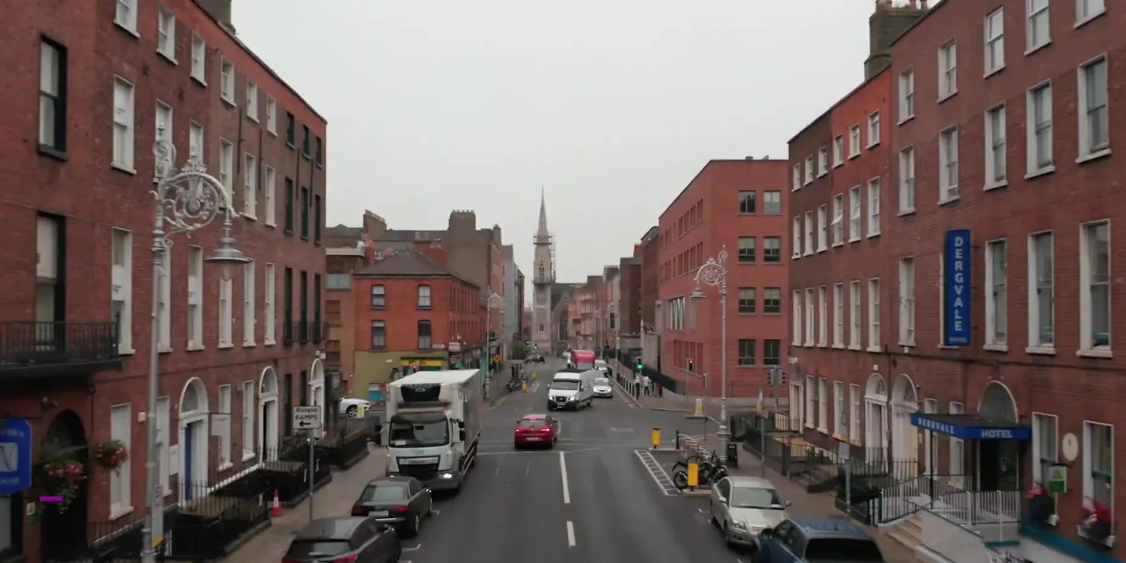 A Uniview camera covering a street and shopfronts